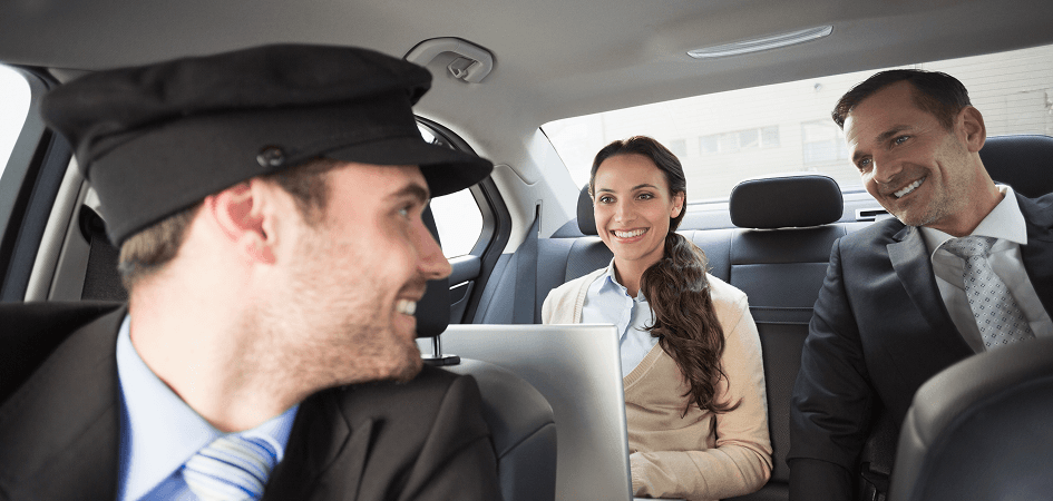 Professional driver and passengers in comfortable transport