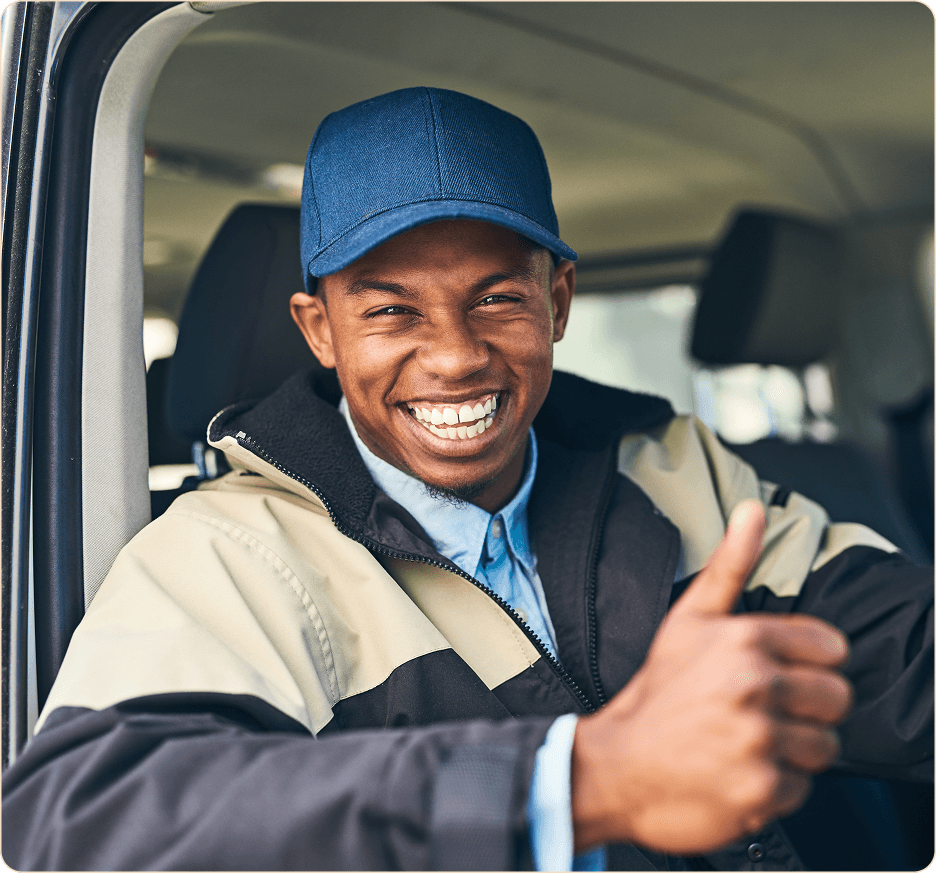 Professional driver loading delivery van